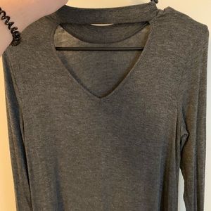 Long sleeve mock neck shirt, cut out in the back